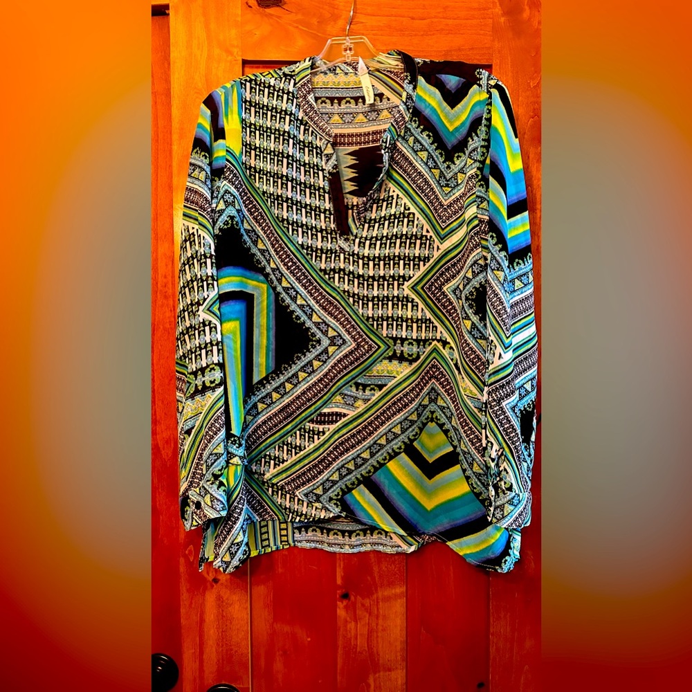 Top in blue green, white and black colors size large.